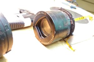 Клин объектива Canon SX100. Песок и пыль после пляжа.